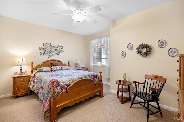 bedroom with baseboards, light carpet, and ceiling fan