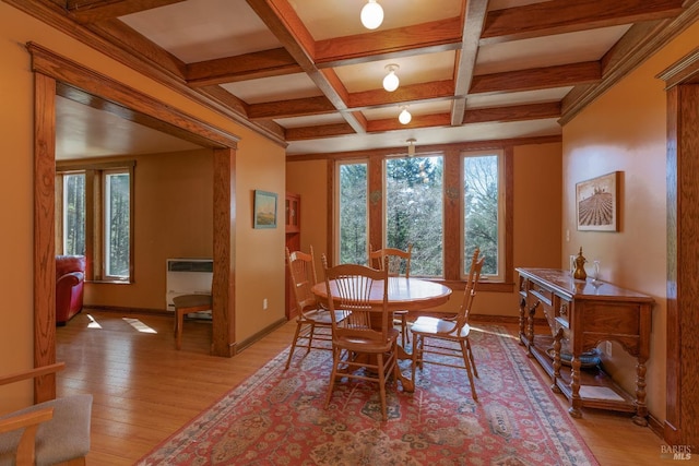 28900 Timberline Rd, Willits, CA 95490 - dining space with beamed ceiling, heating unit, baseboards, and light wood-type flooring