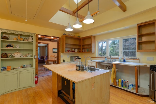 28900 Timberline Rd, Willits, CA 95490 - kitchen featuring open shelves, a sink, a kitchen island with sink, light wood finished floors, and decorative light fixtures