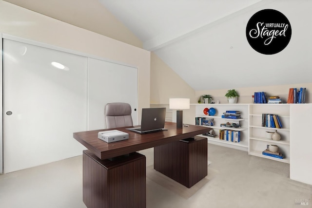 office area with vaulted ceiling and light carpet