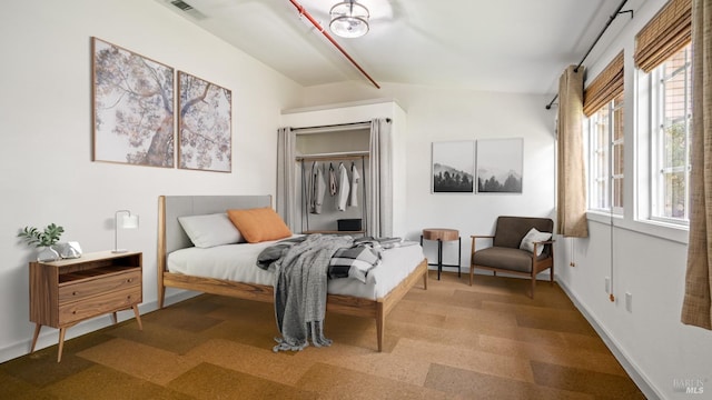 3880 Doris Murphy Ct, Occidental, CA 95465 - bedroom featuring baseboards and beam ceiling