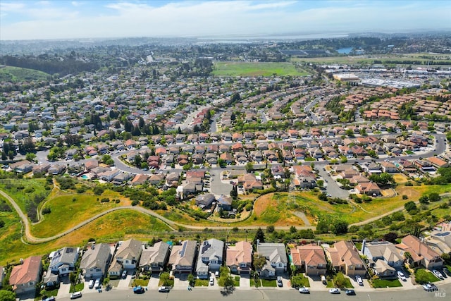birds eye view of property with a residential view