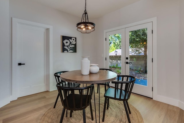 2701 Swanston Oaks, Sacramento, CA 95818 - dining space featuring light wood-style flooring and french doors