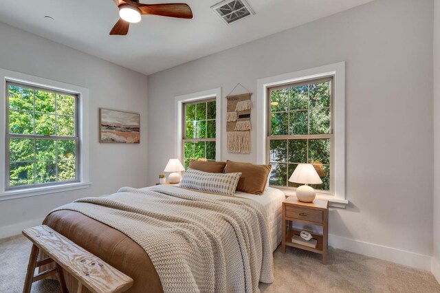 2701 Swanston Oaks, Sacramento, CA 95818 - bedroom featuring light carpet, multiple windows, and baseboards