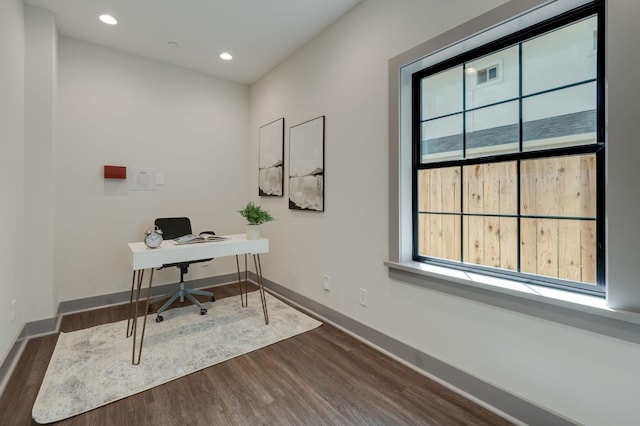 office area with baseboards, a healthy amount of sunlight, dark wood-style floors, and recessed lighting