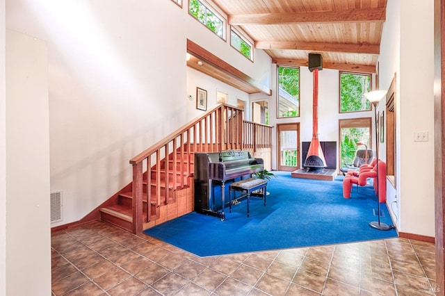 2 Pine Flat Rd, Cazadero, CA 95421 - living area featuring stairs, a towering ceiling, beamed ceiling, wooden ceiling, and visible vents