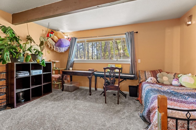 carpeted bedroom featuring baseboards and beam ceiling