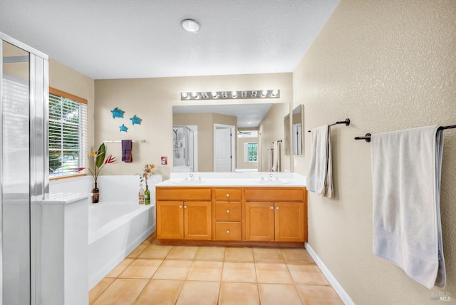 full bath with double vanity, a shower stall, a bath, and a sink