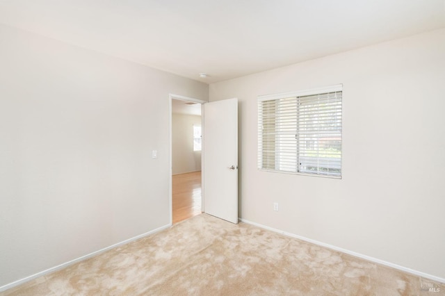 2915 N Texas St Unit 121, Fairfield, CA 94533 - unfurnished room featuring light carpet, baseboards, and a smoke detector