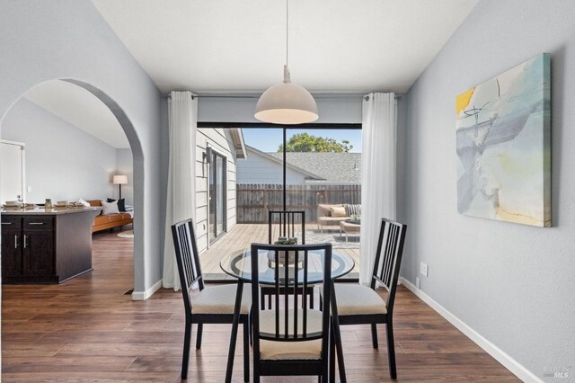 interior details with wood finished floors and a fireplace
