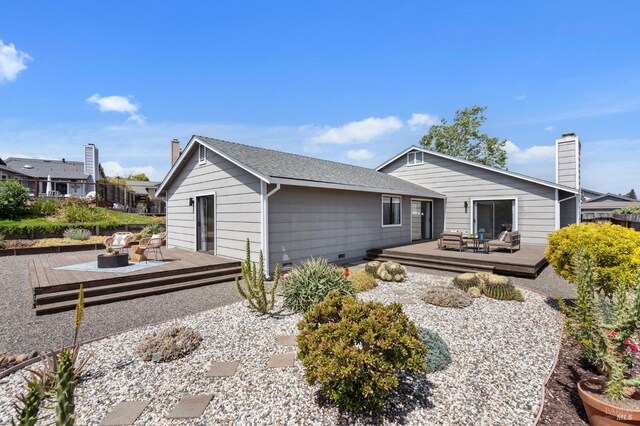 exterior space featuring beamed ceiling and wood finished floors