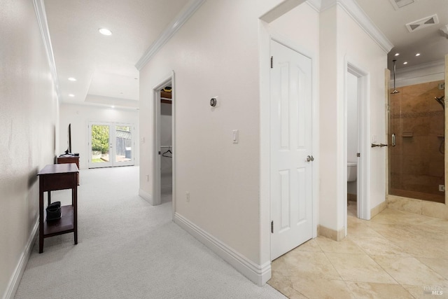 hallway with baseboards, ornamental molding, and recessed lighting