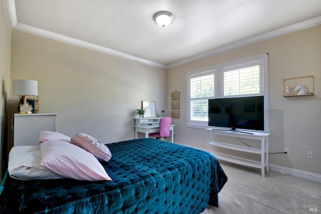 carpeted bedroom with baseboards and ornamental molding
