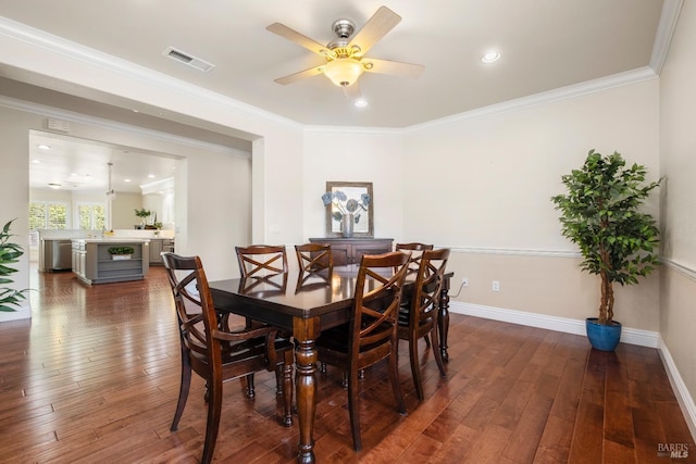 dining room with dark wood finished floors, ceiling fan, visible vents, and recessed lighting