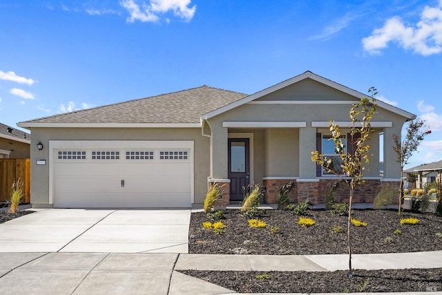 view of front facade featuring concrete driveway, stone siding, covered porch, a garage, and stucco siding