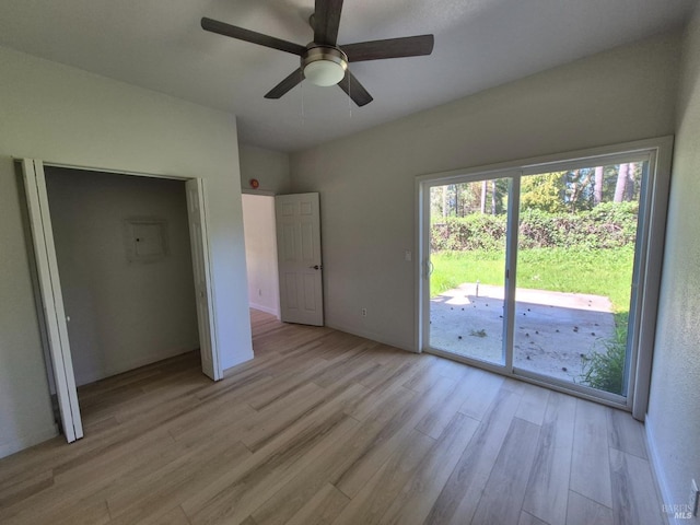unfurnished bedroom with light wood-type flooring, ceiling fan, and access to outside
