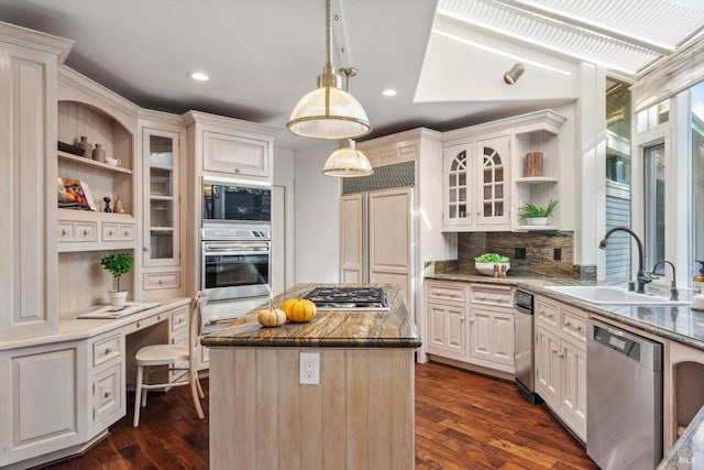 kitchen with a sink, dark wood-style flooring, open shelves, a kitchen island, and appliances with stainless steel finishes