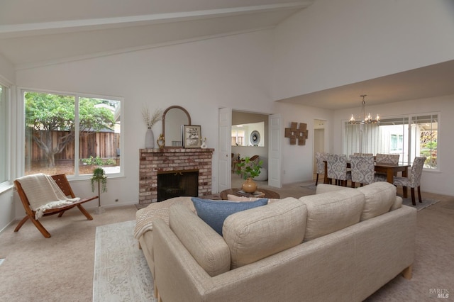 living room with beam ceiling, a notable chandelier, and plenty of natural light