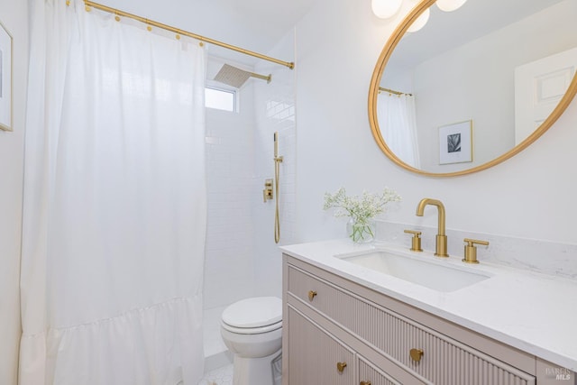 bathroom featuring a shower with shower curtain, toilet, and vanity