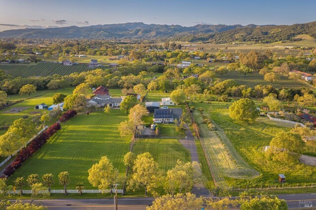 bird's eye view with a mountain view and a rural view