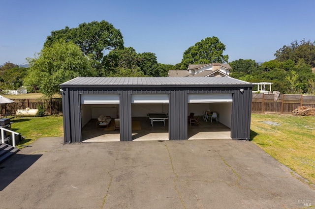 detached garage with fence