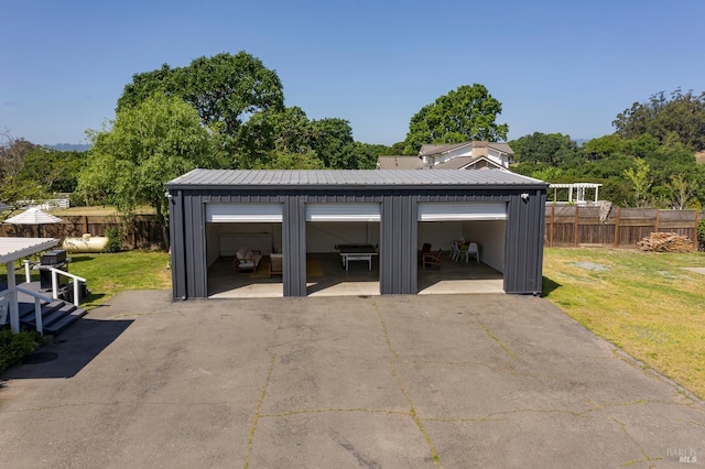 detached garage with fence
