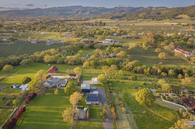 aerial view featuring a rural view and a mountain view