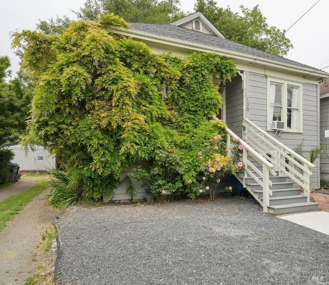 view of front of house featuring stairs