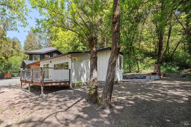 view of front of house with a wooden deck
