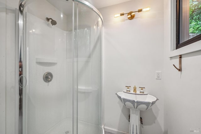 full bathroom with a shower stall