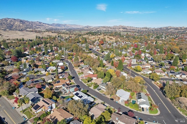 drone / aerial view featuring a mountain view and a residential view