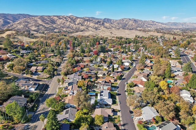 drone / aerial view with a mountain view and a residential view