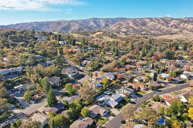aerial view with a mountain view and a residential view