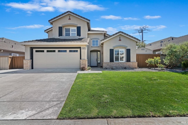 view of front facade with a front lawn, driveway, fence, stucco siding, and brick siding
