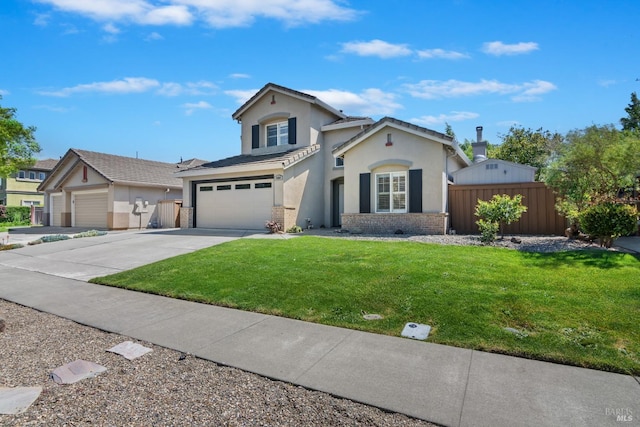 traditional-style house featuring a garage, driveway, stucco siding, and fence