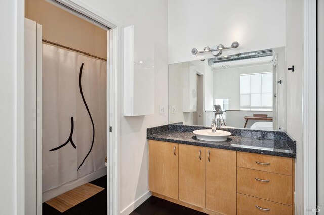 full bathroom featuring vanity