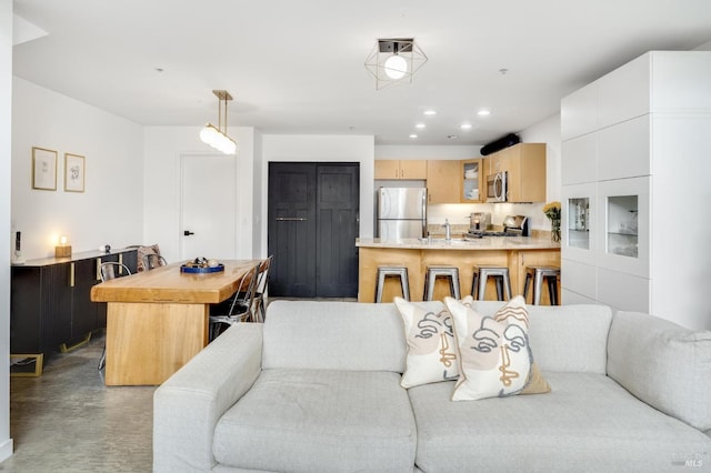 living area with recessed lighting