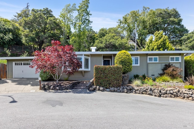 90 Corte Placida, Greenbrae, CA 94904 - view of front of house with an attached garage and driveway