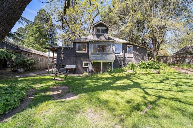 735 Robinson Rd, Sebastopol, CA 95472 - rear view of house with fence and a lawn