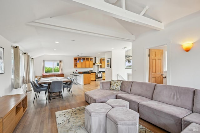 1 Joaquin Patio, Stinson Beach, CA 94970 - living room featuring vaulted ceiling with beams, recessed lighting, and light wood-style flooring