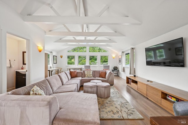 1 Joaquin Patio, Stinson Beach, CA 94970 - living room featuring vaulted ceiling with beams and light wood-style floors