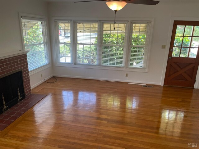 639 E 5th St, Benicia, CA 94510 - unfurnished living room with ceiling fan, light wood finished floors, and a fireplace