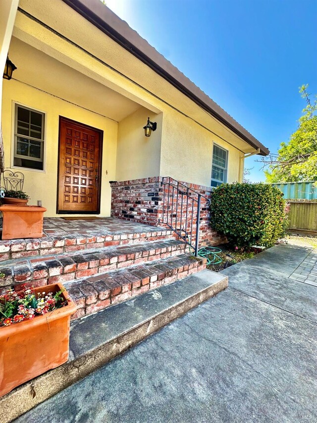 639 E 5th St, Benicia, CA 94510 - property entrance featuring stucco siding and brick siding