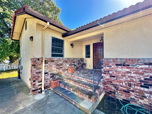 639 E 5th St, Benicia, CA 94510 - washroom featuring stacked washing machine and dryer