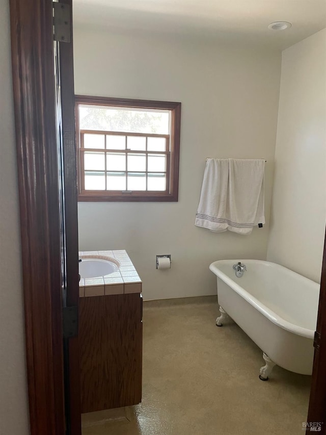 639 E 5th St, Benicia, CA 94510 - bathroom featuring a freestanding bath and vanity