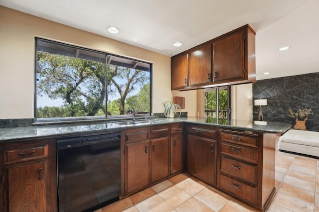 kitchen featuring light tile patterned floors, a sink, recessed lighting, black dishwasher, and a peninsula