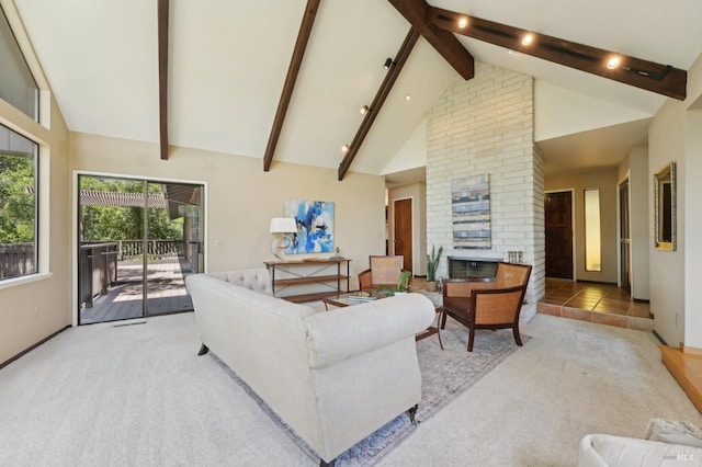 living room with baseboards, beam ceiling, light carpet, a fireplace, and high vaulted ceiling