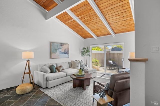 living room with beamed ceiling, wooden ceiling, stone tile flooring, high vaulted ceiling, and baseboards