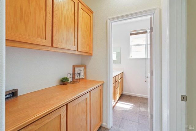 1606 Chamberlain Dr, Fairfield, CA 94533 - hall with light tile patterned floors and baseboards