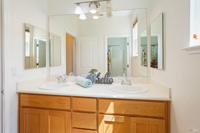1606 Chamberlain Dr, Fairfield, CA 94533 - bathroom featuring a shower with curtain, double vanity, and a sink